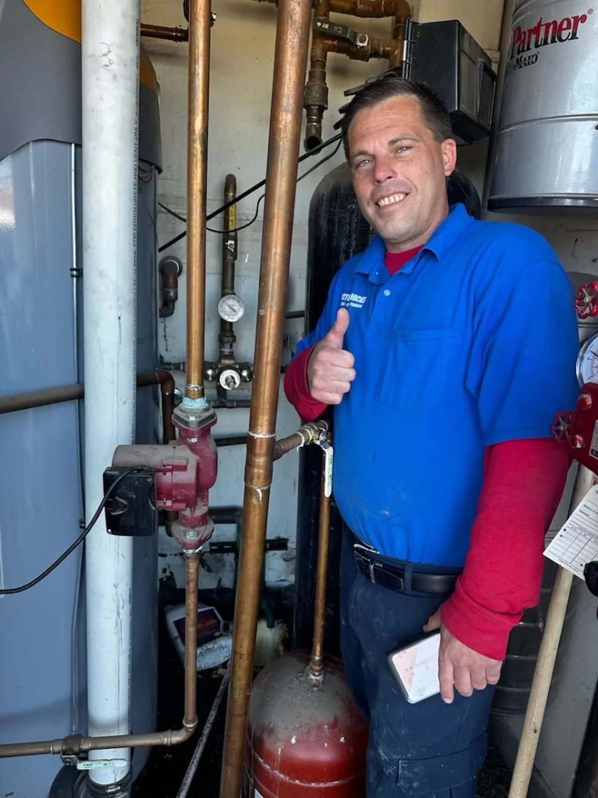 Picture Rocks plumber servicing a water heater